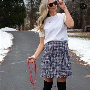 Blue, pink, white and black skirt.